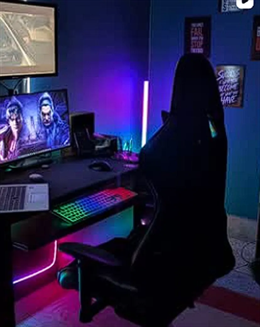 RGB desk setup with monitor, keyboard, and work chair